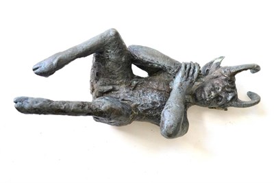 Lot 910 - A Bronze Figure of Pan, 20th century, seated holding pipes, on a cast stone plinth and...