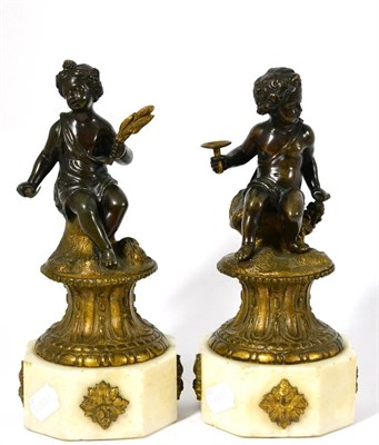 Lot 919 - A Pair of French Bronze Figures of a Boy and Girl, late 19th century, from a set of the...