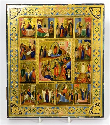 Lot 932 - A Russian Icon, painted with scenes from the Life of Christ within a foliate and strapwork...