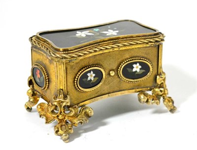 Lot 936 - A Gilt Metal Jewellery Casket and Cover, 19th century, of shaped rectangular form set with...