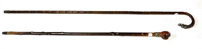 Lot 943 - An Edwardian Silver Mounted Partridgewood Walking Cane, the mounts London 1904, the silver terminal