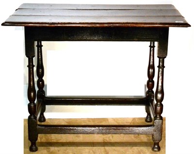 Lot 968 - A Late 17th Century English Joined Oak Side Table, the three-plank top above a plain frieze, raised