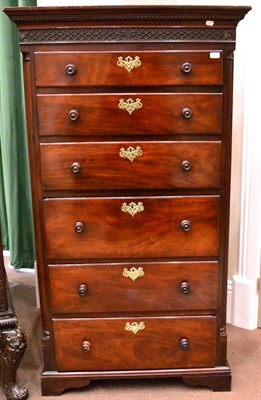 Lot 985 - An Unusual George II Mahogany Secretaire Chest, with a dentilled cornice and blind fretted...