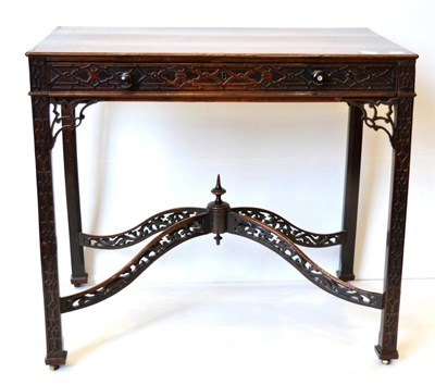 Lot 1020 - A Mahogany Side Table, the rectangular moulded top over a blind-fretted frieze with drawer, on...