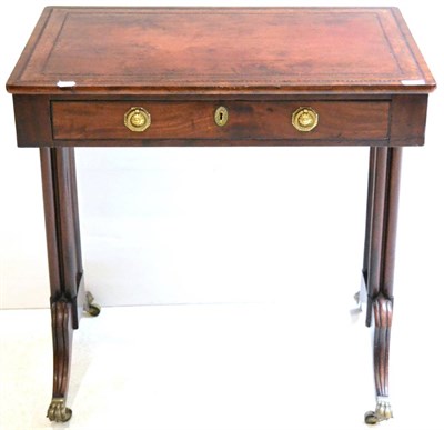 Lot 1027 - A Small Regency Mahogany Writing Table, the rectangular top inset with red leather, over a...