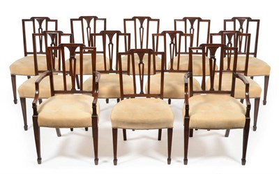 Lot 1070 - A Set of Twelve George III Mahogany Dining Chairs, circa 1800, comprising ten singles and two...