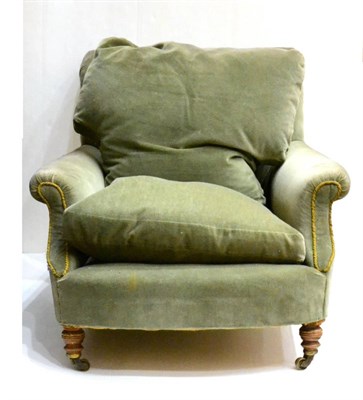 Lot 1076 - A Victorian Easy Chair, probably Howard and Sons, upholstered in olive-green dralon, the...