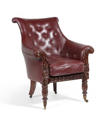 Lot 1077 - A George IV Rosewood Framed Easy Chair, upholstered in deep-buttoned oxblood coloured leather,...