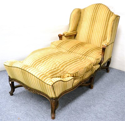 Lot 1085 - A Louis XVI Style Duchese Brisée, late 19th century, recovered in close-nailed beige striped...