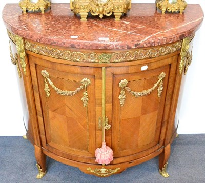 Lot 1099 - A French Louis XVI Style Kingwood and Gilt Metal Mounted Demi-Lune Commode, late 19th century,...