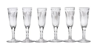 Lot 2 - A Set of Six Ale Flutes, circa 1770, the rounded funnel bowls engraved with hops and...