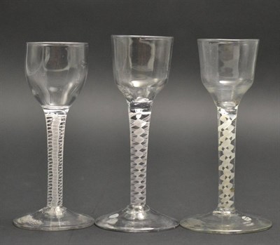 Lot 19 - A Wine Glass, circa 1760, the ogee bowl on an opaque twist stem, 14.5cm high; A Similar Wine Glass