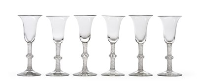 Lot 26 - A Set of Six Wine Glasses, circa 1760, the bell shaped bowls on knopped opaque twist stems,...