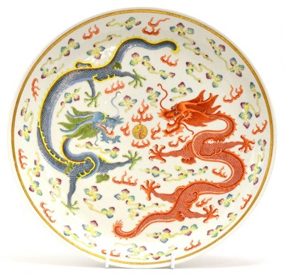 Lot 60 - A Chinese Porcelain Saucer Dish, Guangxu mark and of the period, painted in famille rose...