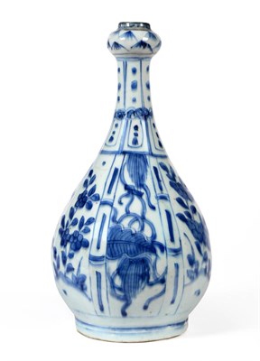 Lot 86 - A Kraak Porcelain Bottle, Wanli period, typically painted in underglaze blue with panels of...