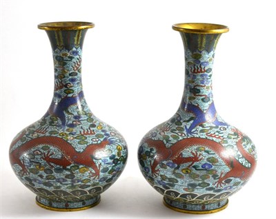 Lot 127 - A Pair of Chinese Cloisonné Enamel Bottle Vases, 19th century, decorated with dragons chasing...