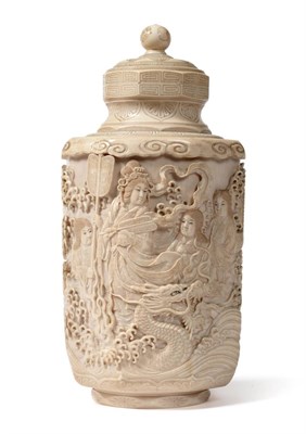 Lot 140 - A Japanese Ivory Vase and Cover, Meiji period, of panelled oval section, carved with figures...
