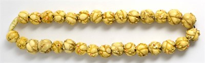 Lot 145 - A Set of Thirty Japanese Carved Ivory Beads/Ojime, Meiji period, each carved as a ball of rats,...
