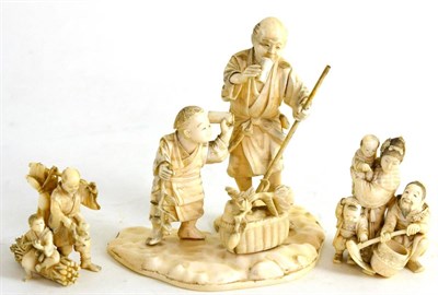 Lot 148 - A Japanese Ivory Okimono, Meiji period, as a man and boy with a basket of flowers, signed to...