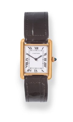 Lot 154 - An 18ct Gold Rectangular Wristwatch, signed Cartier, model: Tank, circa 1985, lever movement, white