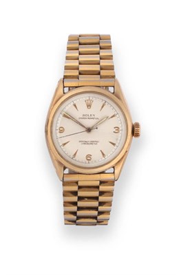 Lot 158 - A 9ct Gold Automatic Centre Seconds Wristwatch, signed Rolex, Oyster, Perpetual, Officially...
