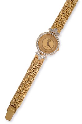 Lot 164 - A Lady's 18ct Gold Diamond Set Wristwatch, signed Omega, model: DeVille, circa 1980, quartz...