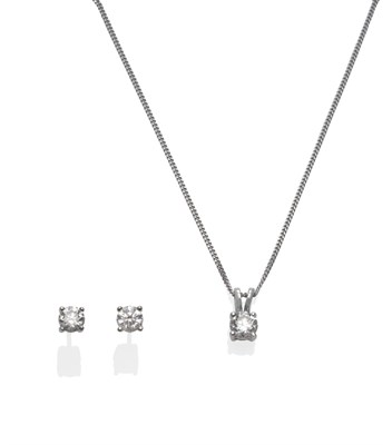 Lot 203 - An 18 Carat White Gold Diamond Solitaire Pendant on Chain, the round brilliant cut diamond in a...