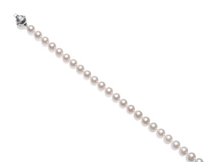 Lot 220 - A Cultured Pearl Necklace, the uniform pearls knotted to a spherical 18ct white gold catch with...