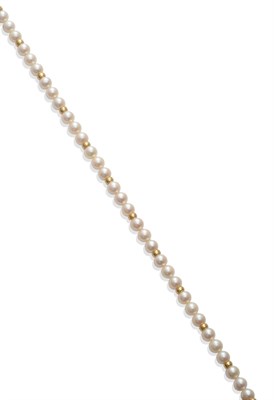 Lot 229 - A Cultured Pearl Necklace, fifty-two round cultured pearls with gold hoop spacers, length 41.5cm