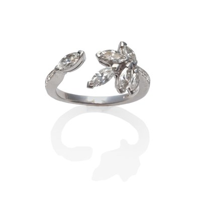 Lot 240 - A Platinum Diamond 'Firefly' Ring, by Boodle & Dunthorne, set with six marquise cut diamonds in...