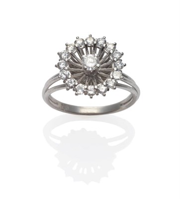 Lot 242 - A Diamond Cluster Ring, a Catherine-wheel style basket cluster, with a round brilliant cut...