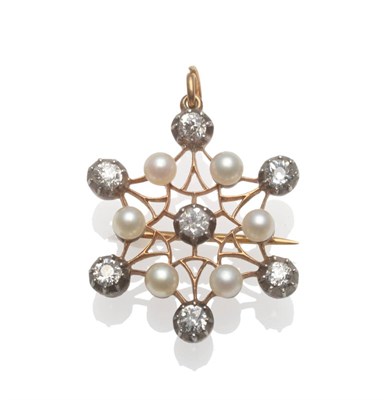 Lot 265 - A Victorian Diamond and Pearl Brooch, in a spider web form, seven old cut diamonds in collet...