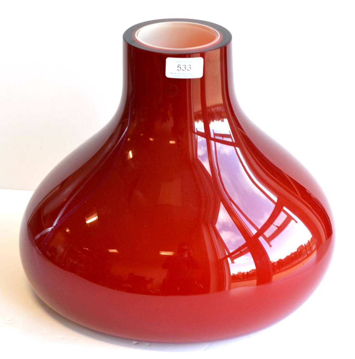 Lot 533 - A Salviati Fiesolani Vase, designed by Nigel Coates, red cased, labelled VENEZIA SALVIATI MADE...