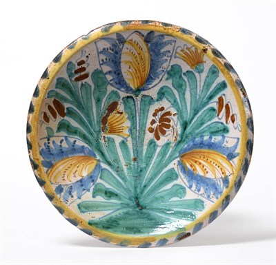 Lot 3 - An English Delftware Blue Dash Tulip Charger, circa 1685, of circular form decorated in blue,...