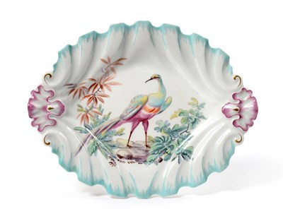 Lot 6 - A Chelsea Gold Anchor Period Scalloped Oval Dish, circa 1760, decorated with an exotic bird perched