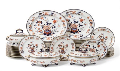 Lot 12 - A Royal Worcester Earthenware Dinner Service, 1883, each piece decorated in an Imari palette...