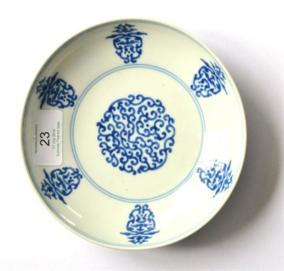 Lot 23 - A Chinese Porcelain Saucer Dish, Qianlong reign mark, painted in underglaze blue with a roundel...