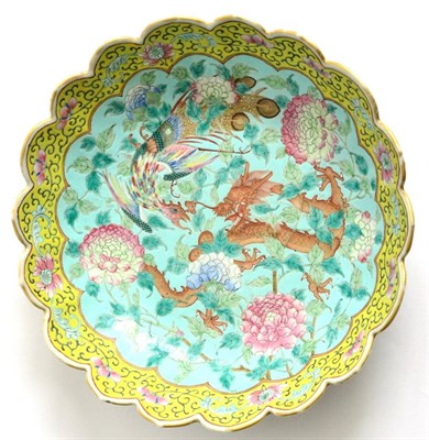 Lot 27 - A Chinese Yellow Ground Petal Edged Bowl, 19th century, the circular bowl with petal edged rim, the