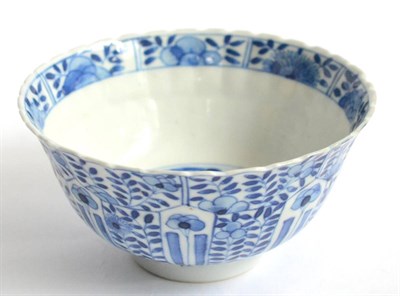 Lot 28 - A Chinese Blue and White Bowl, of ribbed U shape, decorated in underglaze blue with panels of...