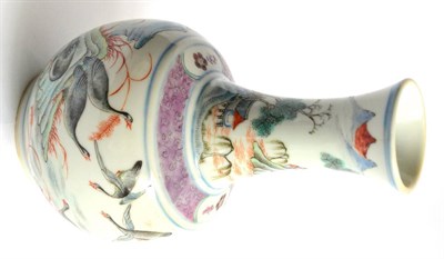 Lot 40 - A Chinese Famille Rose Bottle Vase, decorated with a continuous band of geese in a landscape...
