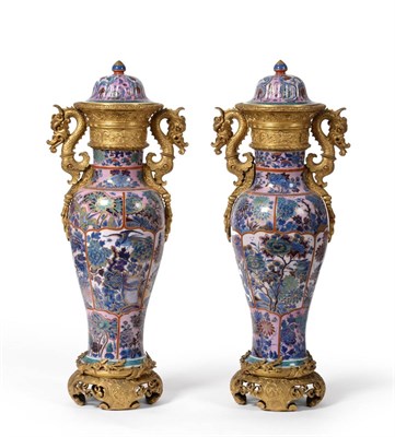 Lot 45 - A Pair of Ormolu Mounted Chinese Porcelain Vases and Covers, early 19th century, the blue and white