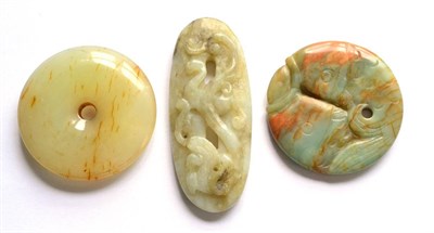 Lot 56 - Three Small Chinese Jade Carvings, one formed as a plain circular pierced disc, one as two...