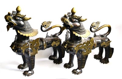 Lot 63 - A Large Pair of Oriental Parcel Gilt Bronze Fo Dogs, possibly Tibetan, 19th/20th century, each...