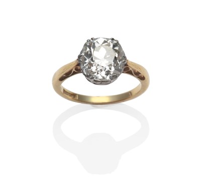 Lot 133 - A Diamond Solitaire Ring, an old cut cut diamond, in a white claw setting, on a yellow tapered...