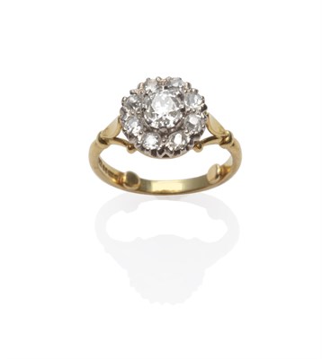 Lot 139 - An 18 Carat Gold Diamond Cluster Ring, set with old cut diamonds in white claw settings, to...