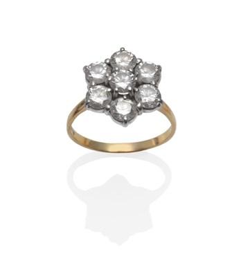 Lot 148 - An 18 Carat Gold Diamond Cluster Ring, set with seven round brilliant cut diamonds in white...