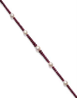 Lot 153 - A Ruby and Cultured Pearl Necklace, cabochon ruby beads set with cultured pearls at intervals,...