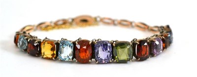 Lot 177 - A Multi-Gemstone Bracelet, the gemstones of various cuts include garnet, citrine, aquamarine,...