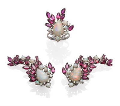 Lot 189 - An Opal, Ruby and Diamond Ring and Earring Set, pear shaped and round opals, marquise cut and round