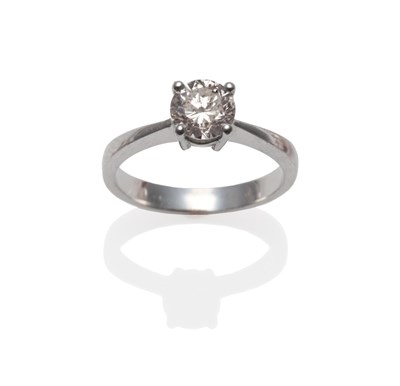 Lot 191 - A 14 Carat Gold Diamond Solitaire Ring, the round brilliant cut diamond in a four claw setting,...